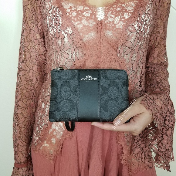 Coach Handbags - NWT COACH SIGNATURE PVC LEATHER BLACK WRISLET